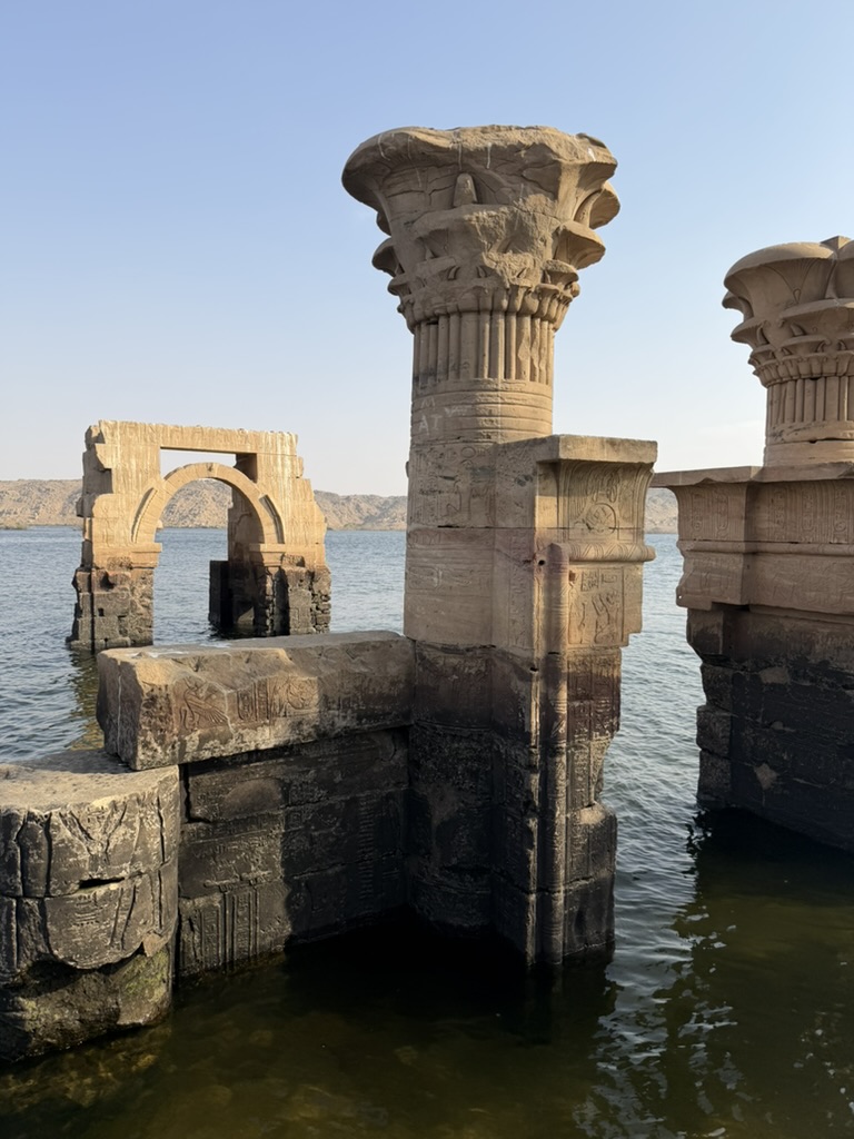 Philae temple columns rising from the Nile
